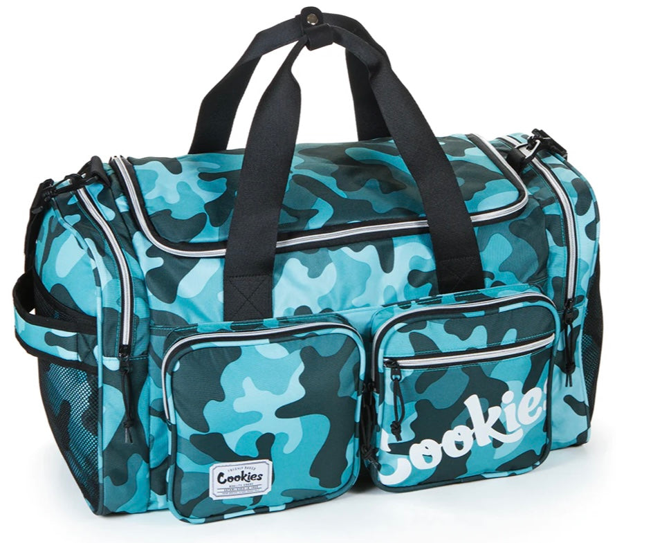 COOKIES HERITAGE SMELL PROOF CANVAS NYLON DUFFEL BAG W/ FRONT CARGO POCKETS & DUAL SIDE POCKETS - Smoke N’ Poke